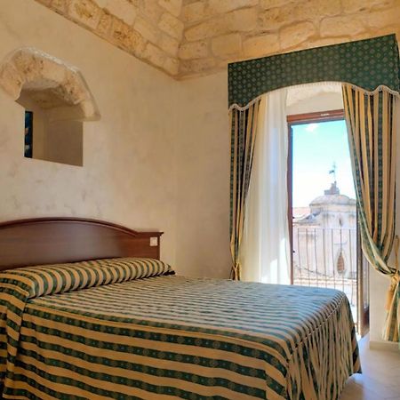 Rooms Dimora Arco - Affitti Brevi Italia Monte SantʼAngelo Εξωτερικό φωτογραφία
